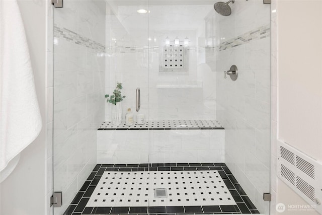 full bathroom featuring a shower stall