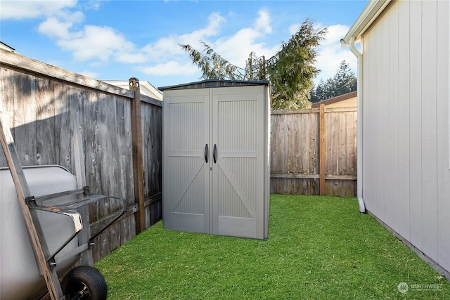 view of outbuilding with a lawn