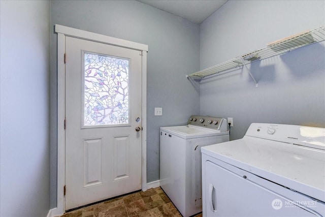 laundry area featuring washing machine and dryer