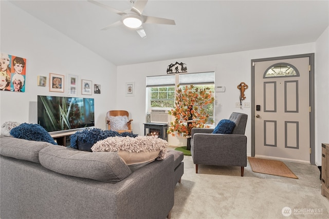 living room with cooling unit, lofted ceiling, ceiling fan, and light colored carpet