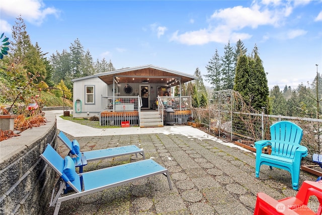 back of house featuring a patio area