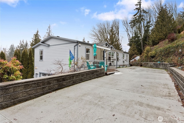 rear view of property with a patio area