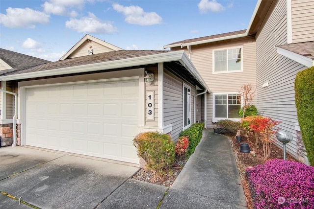 view of front of property featuring a garage