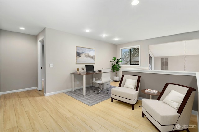 home office featuring light hardwood / wood-style flooring