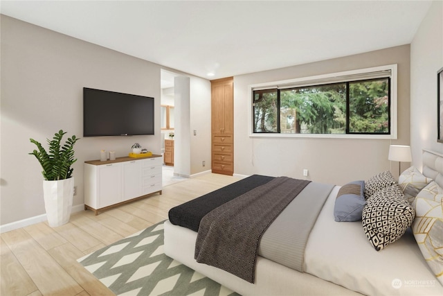 bedroom featuring light hardwood / wood-style flooring