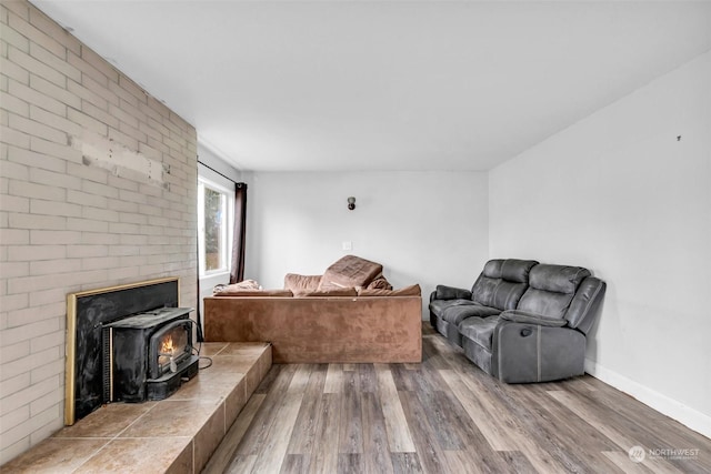 6309 S K St, Tacoma, WA 98408 - living room featuring hardwood / wood-style flooring and a wood stove