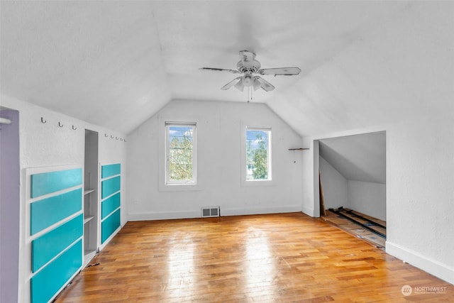 6309 S K St, Tacoma, WA 98408 - additional living space with ceiling fan, vaulted ceiling, and light wood-type flooring