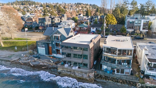 birds eye view of property with a residential view