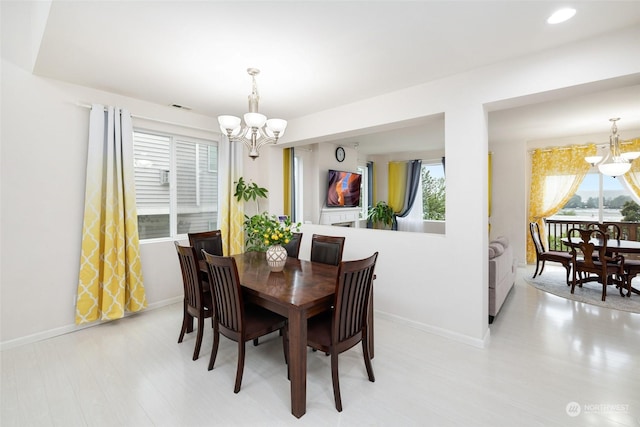 20411 90th Pl S, Kent, WA 98031 - dining area with an inviting chandelier and light hardwood / wood-style flooring