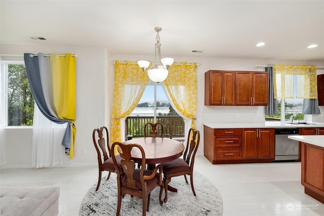 20411 90th Pl S, Kent, WA 98031 - dining room featuring an inviting chandelier and a healthy amount of sunlight