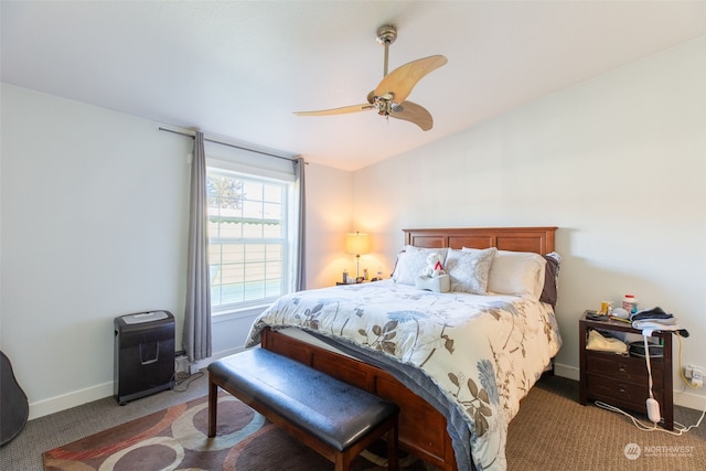 carpeted bedroom with vaulted ceiling and ceiling fan