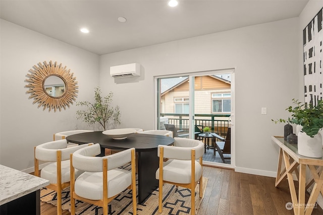 dining area featuring dark hardwood / wood-style flooring and an AC wall unit