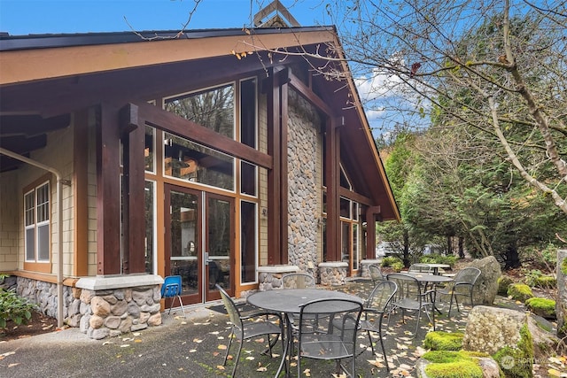 rear view of property with a patio area