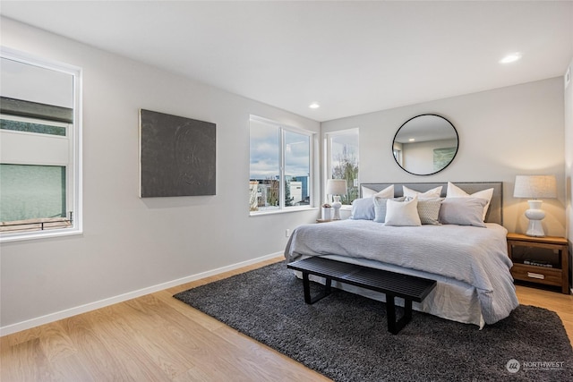 bedroom with light wood-type flooring