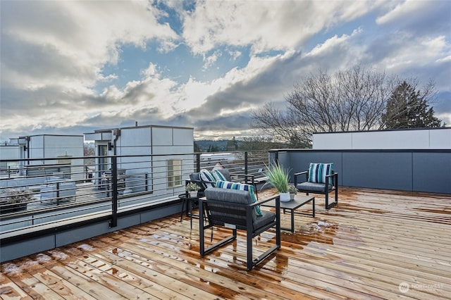 deck featuring outdoor lounge area