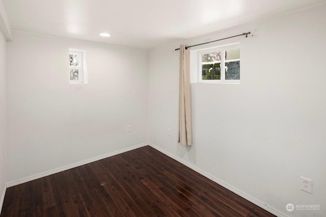 empty room with wood-type flooring