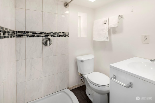 bathroom with vanity, hardwood / wood-style floors, and toilet