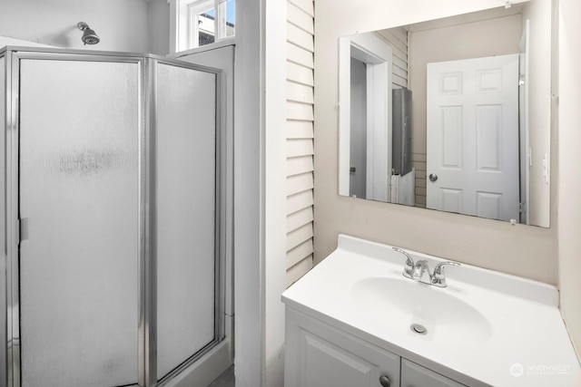 bathroom featuring vanity and walk in shower