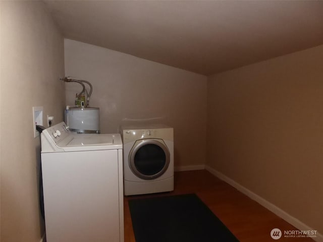 12217 4th Dr SE, Everett, WA 98208 - washroom featuring washing machine and dryer, water heater, and wood finished floors