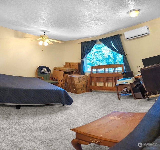 bedroom with carpet flooring, a wall mounted AC, and a textured ceiling