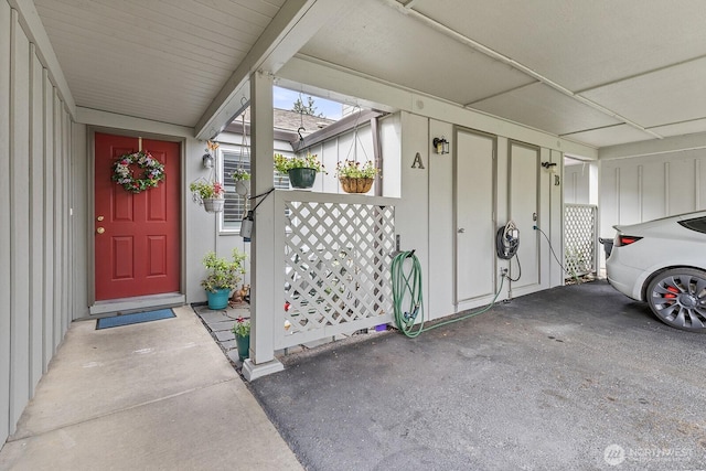 entrance to property featuring board and batten siding