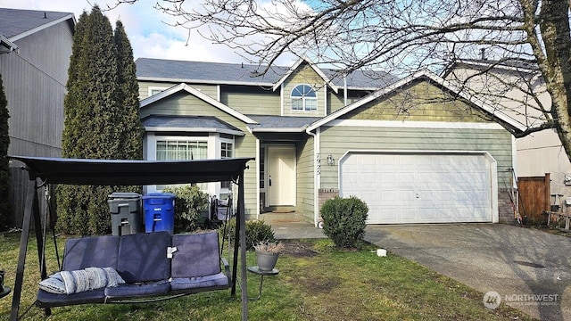 view of front of property featuring a garage