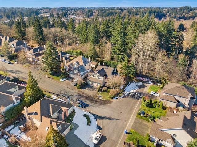 birds eye view of property with a residential view