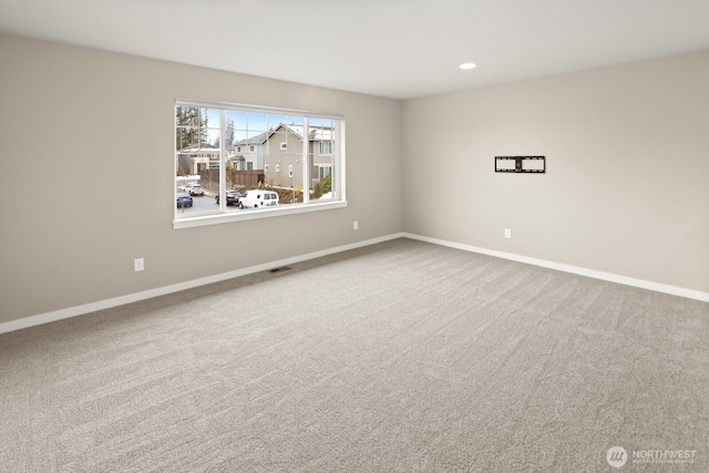 view of carpeted spare room