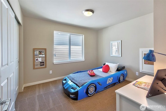 carpeted bedroom with a closet