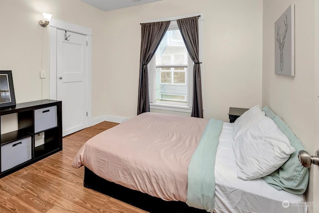 bedroom featuring light hardwood / wood-style flooring