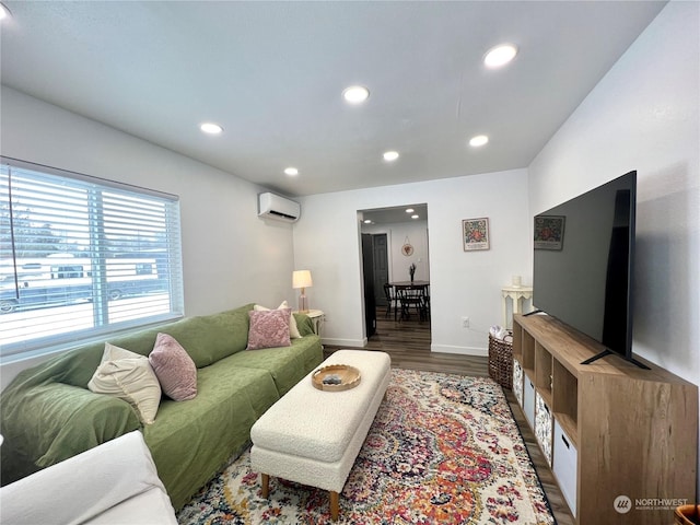 living room featuring an AC wall unit and dark hardwood / wood-style flooring