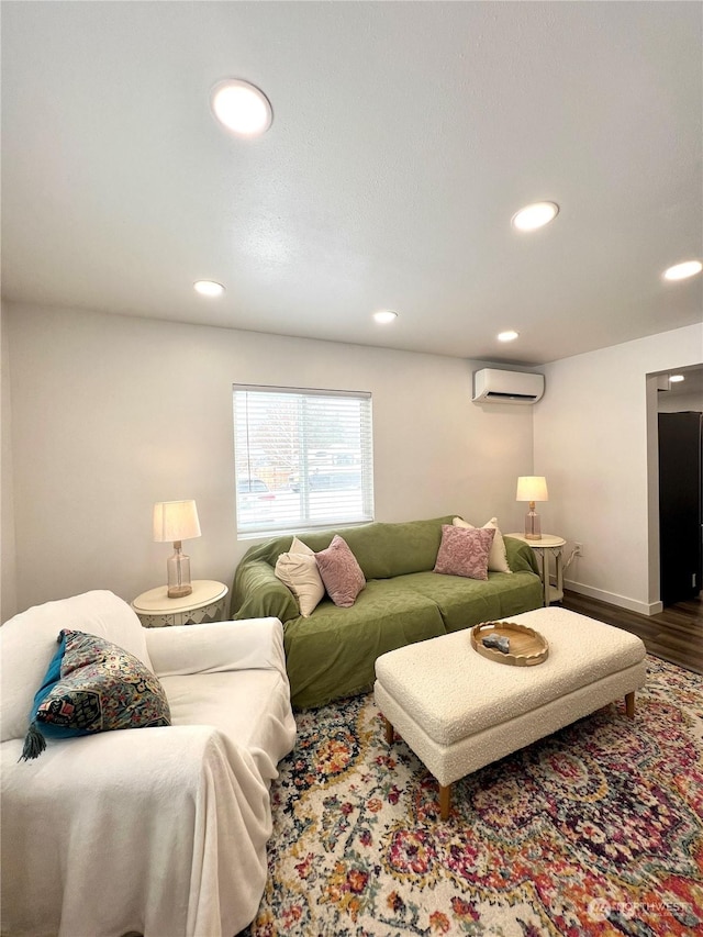 living room featuring hardwood / wood-style floors and a wall mounted AC