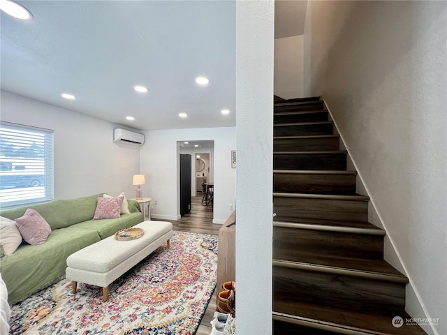 interior space with hardwood / wood-style floors and a wall mounted AC