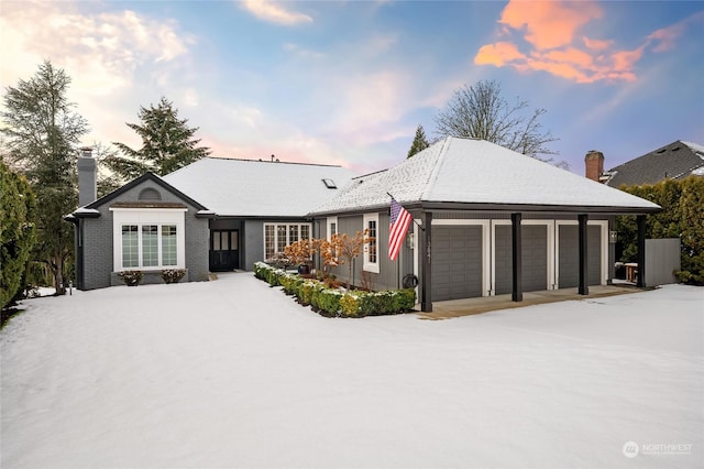 ranch-style home with a garage