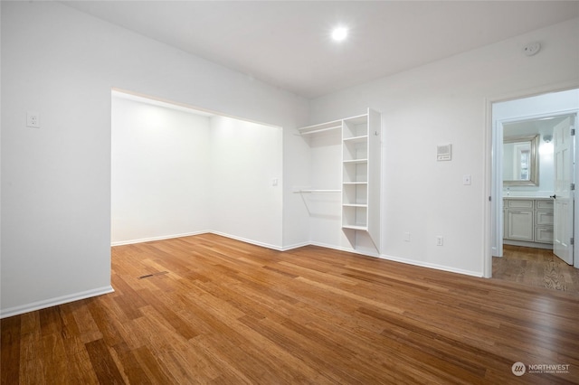 unfurnished room featuring light wood-type flooring