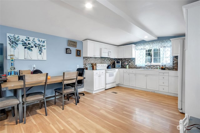 kitchen with white cabinetry, white appliances, light hardwood / wood-style flooring, and backsplash