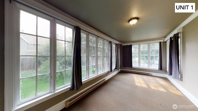 unfurnished sunroom with a baseboard radiator