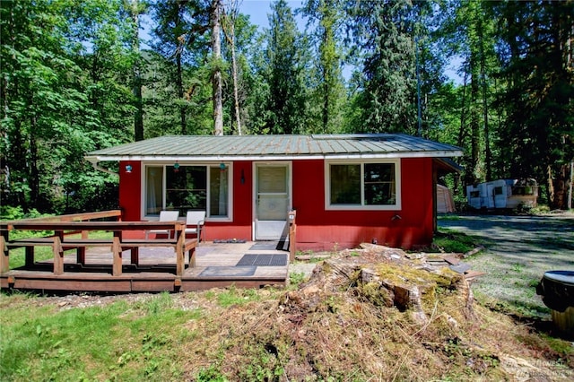 view of front facade featuring a wooden deck