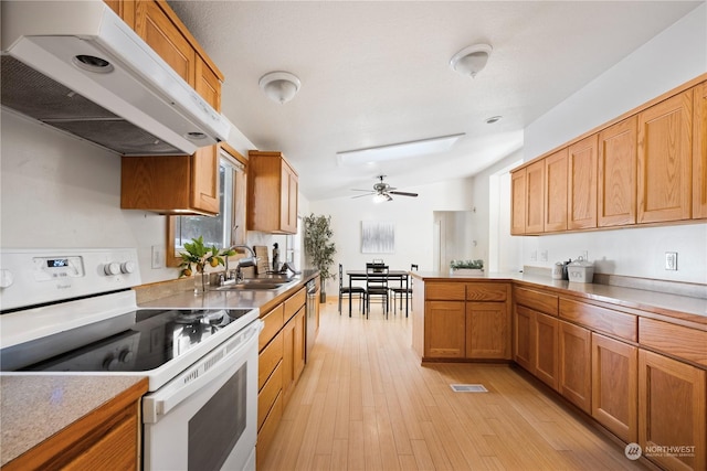 kitchen with dishwasher, sink, white electric range oven, ceiling fan, and light wood-type flooring