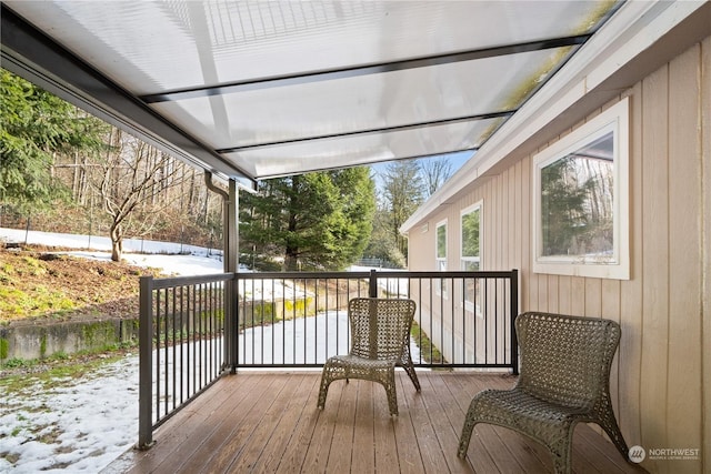 view of snow covered deck