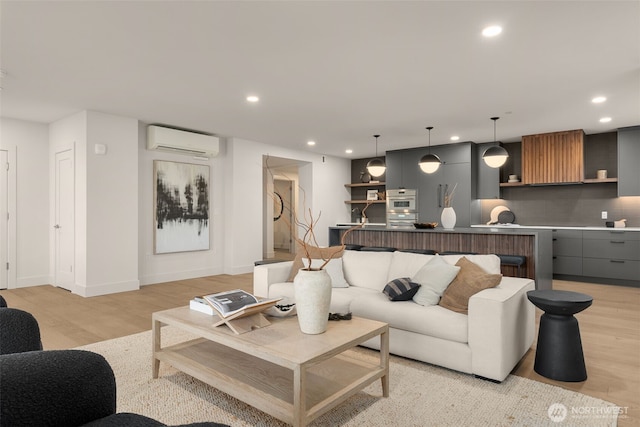 238 4th Ave Unit 100, Kirkland, WA 98033 - living area with a wall unit AC, light wood finished floors, and recessed lighting
