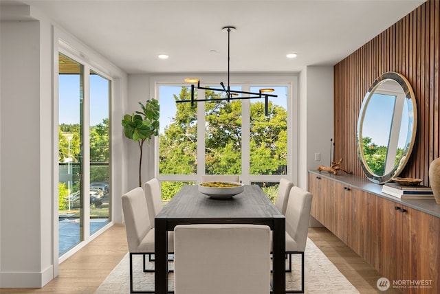 238 4th Ave Unit 100, Kirkland, WA 98033 - dining area featuring light wood-style flooring, a chandelier, healthy amount of natural light, and recessed lighting