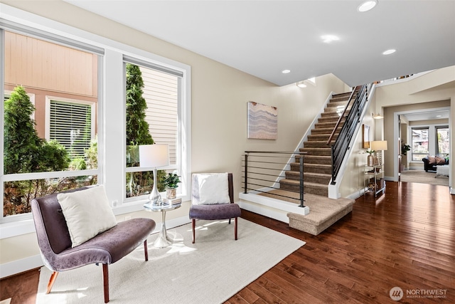 1026 N 41st Pl, Renton, WA 98056 - sitting room featuring dark wood-type flooring, baseboards, stairs, and recessed lighting