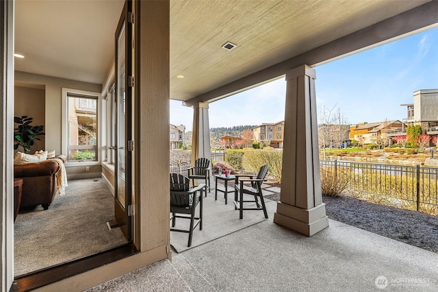 1026 N 41st Pl, Renton, WA 98056 - view of patio with a residential view and fence