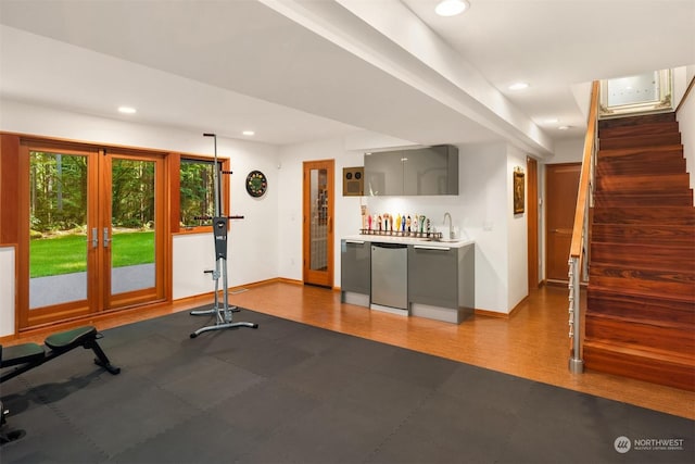 workout area with french doors and wet bar