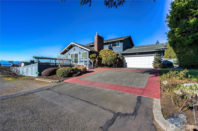 view of front of property featuring a garage