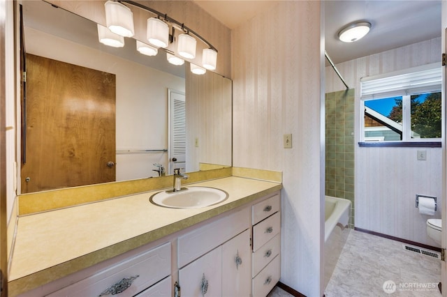 full bathroom with vanity, toilet, and shower / bath combination