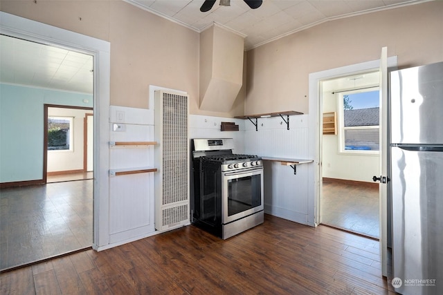 kitchen featuring dark wood-style floors, appliances with stainless steel finishes, open shelves, and ornamental molding