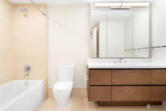 full bathroom featuring vanity, tile patterned flooring, tiled shower / bath combo, and toilet