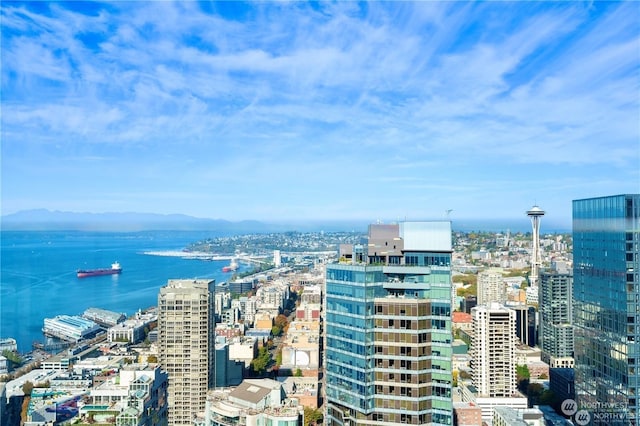 view of city with a water and mountain view